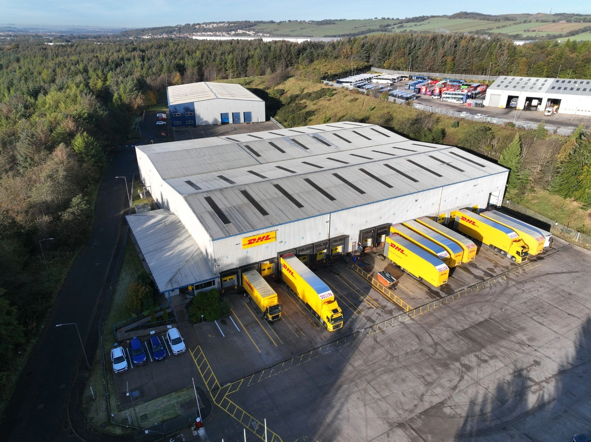 batiment logistique opéré par DHL, et propriété de la société de Gestion Theoreim, pour sa scpi Log in